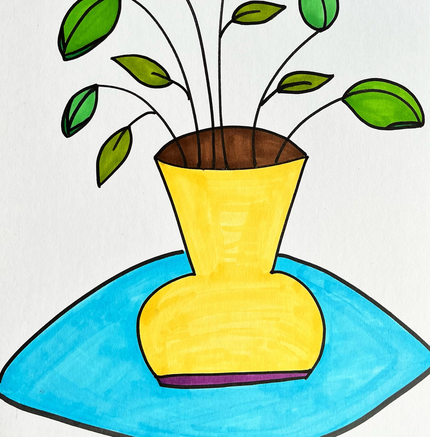 Blue table and yellow vase